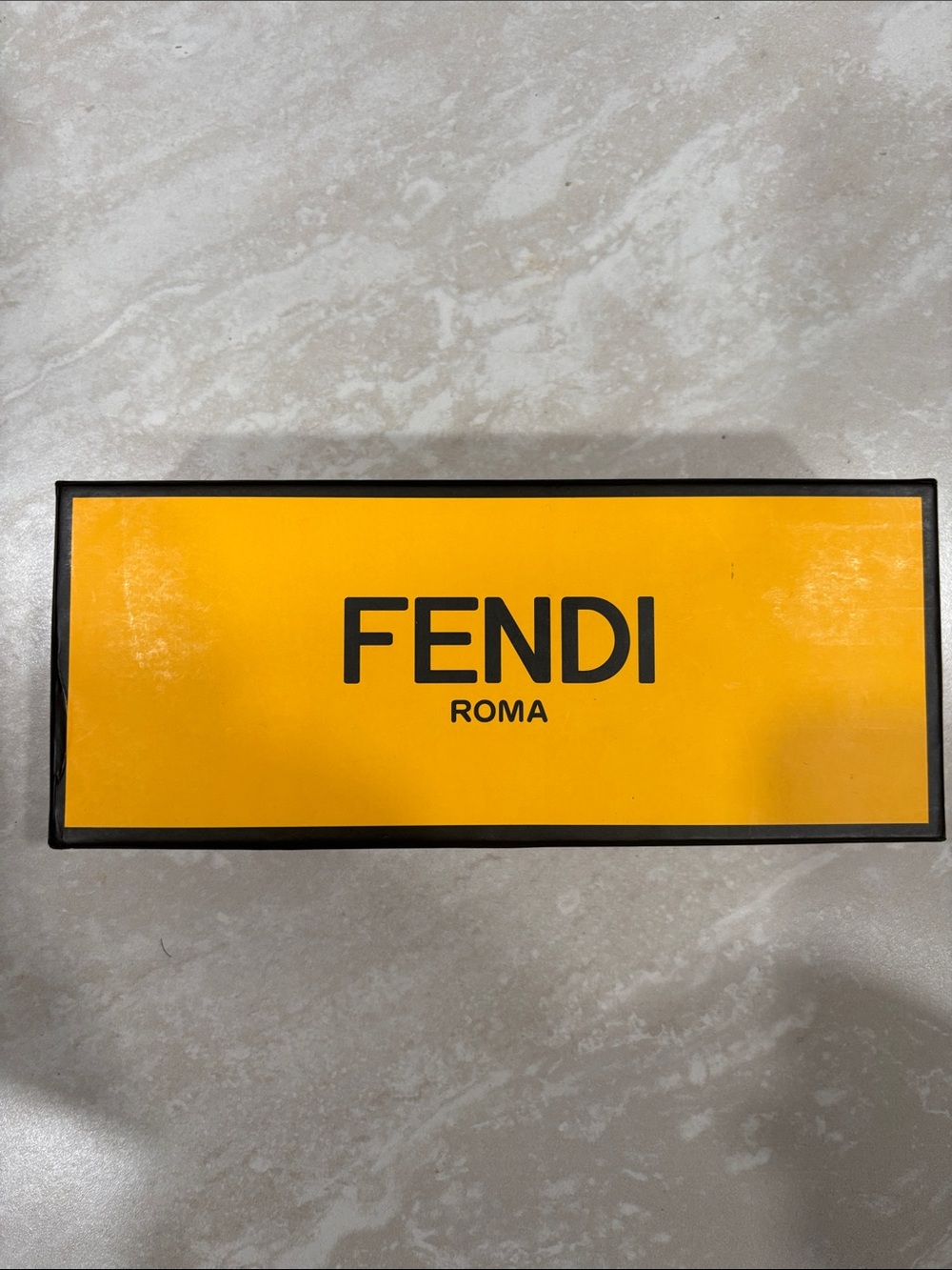 Fendi Bold Yellow Logo Wall Plaque with five pair of socks